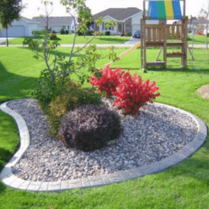 Popular Styles of Concrete Garden Borders Stamped and colored concrete edging around flower beds