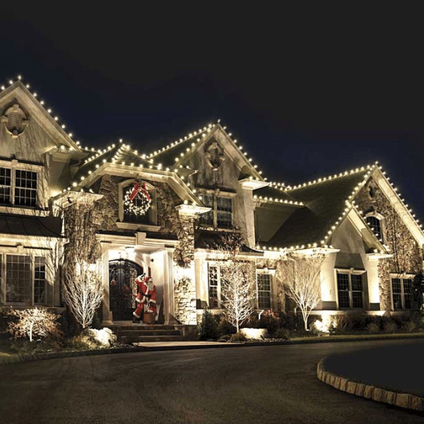 Residential and commercial properties decorated with professional holiday lighting in the Twin Cities