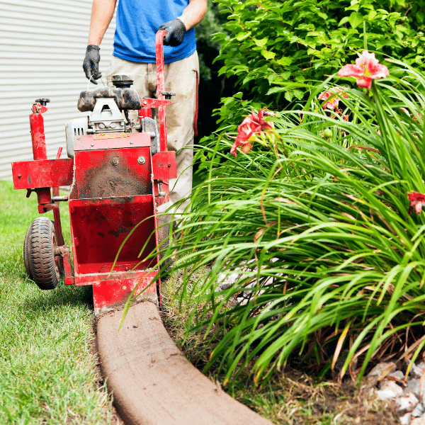 Best Seasons to Install Concrete Curbing Concrete landscape curbing being installed in fall season